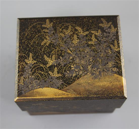 Three Japanese gilt and silver decorated lacquer boxes, late 19th / early 20th century, both 8cm